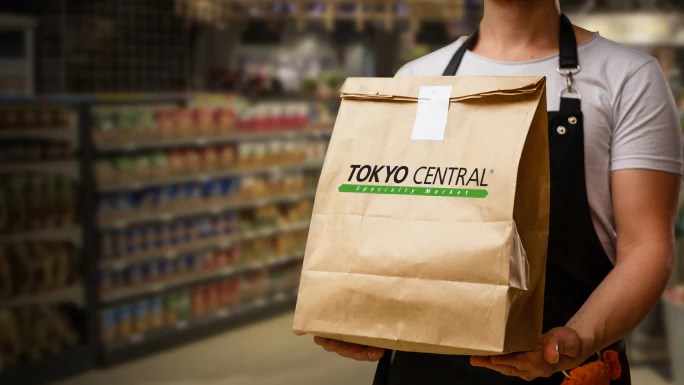 Tokyo Central team member ready to help with your grocery order